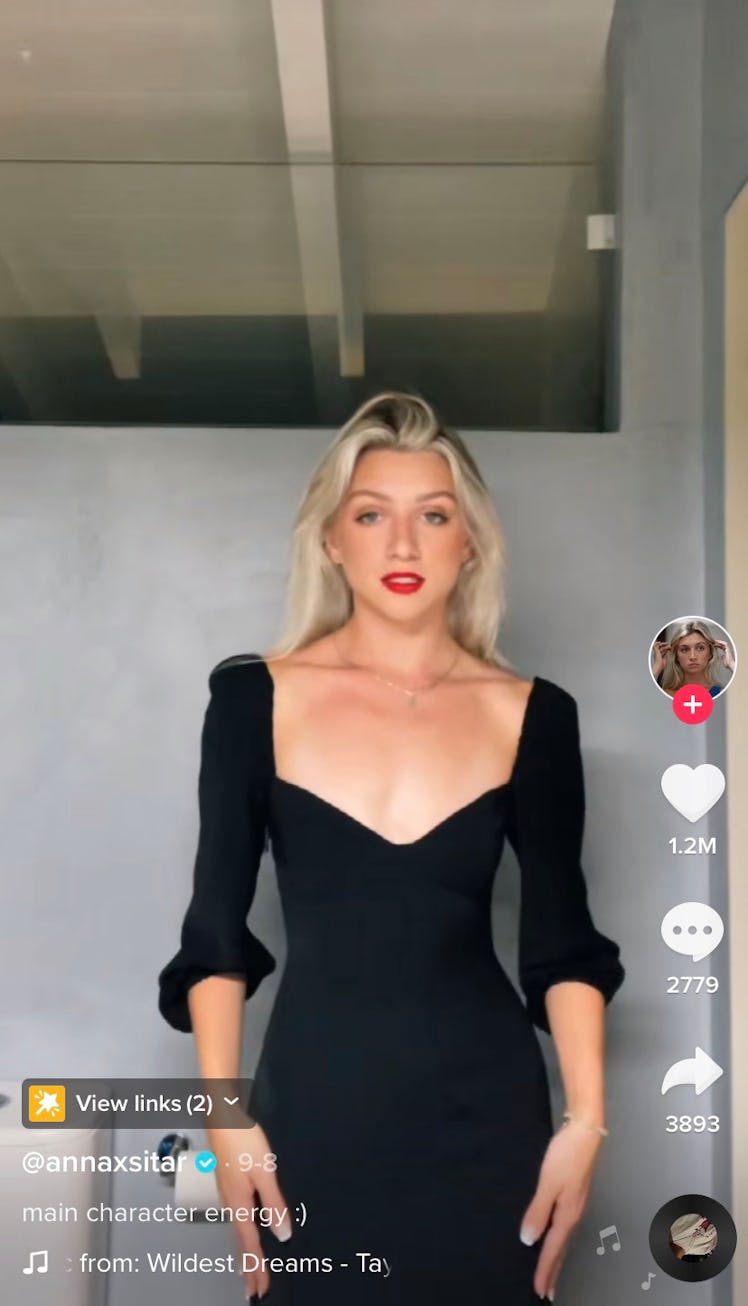 A girl does a TikTok outfit reveal to Taylor Swift's "Wildest Dreams" on TikTok, which could be a cu...