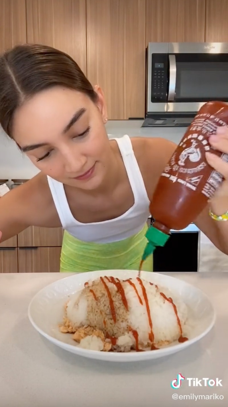 Screenshot of TikToker Emily Mariko making her viral salmon-rice bowl.