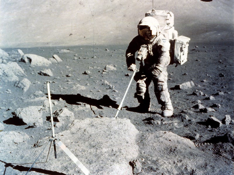Harrison Schmitt works the scoop on the lunar surface, Apollo 17 mission
