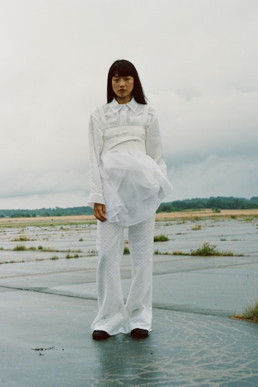 model in white Cecilie Bahnsen shirt and pants