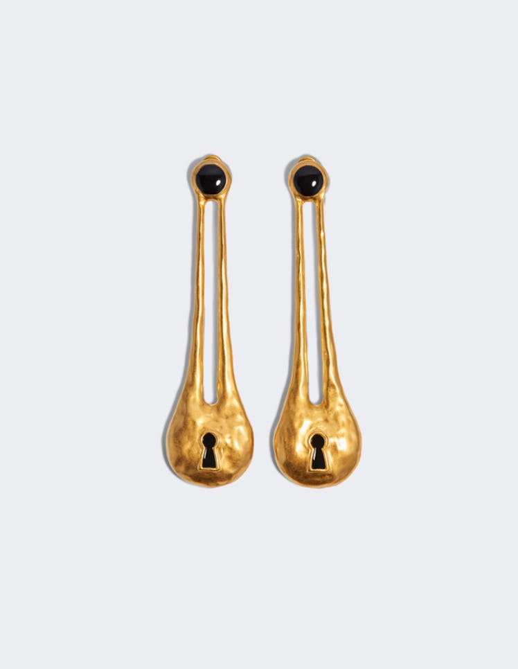 Schiaparelli's gold padlock drop earrings. 