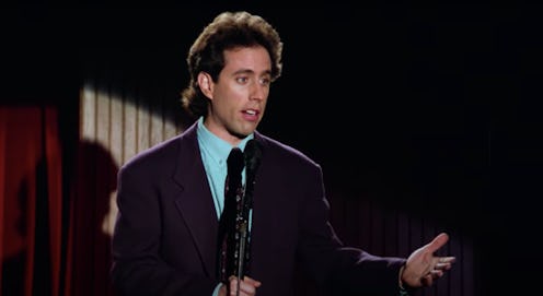 Jerry Seinfeld doing a stand-up set during the pilot episode of 'Seinfeld'.