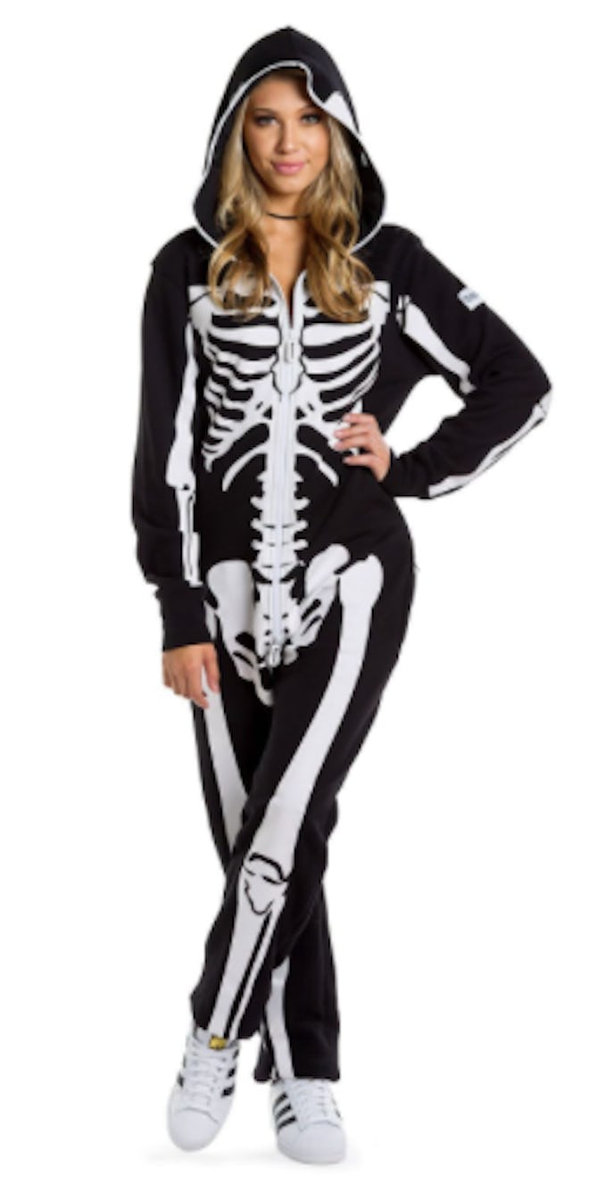 Woman wearing skeleton onesie