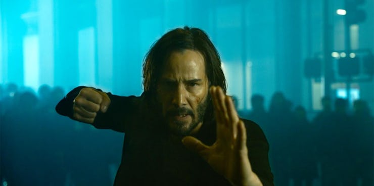 Keanu reeves is back looking angry as neo in matrix 4