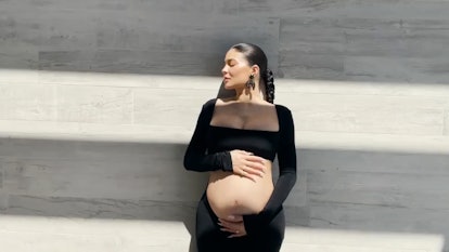 Kylie Jenner in her pregnancy dress which is a Grand Finale Gown from Mirror Palais.