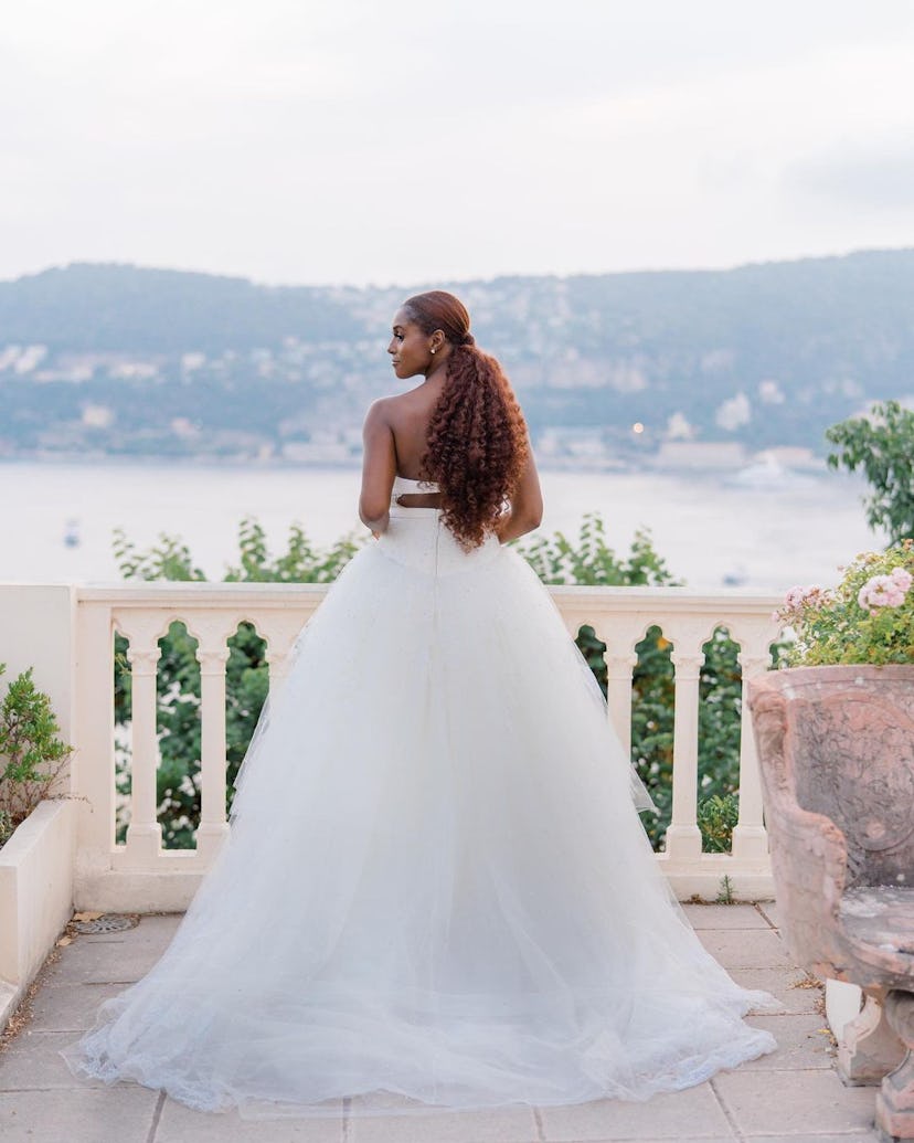 Issa Rae's wedding hairstyle was ponytail with natural curls. It's one of the best bridal hair looks...