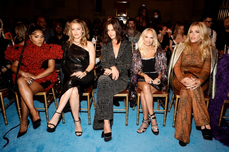 Lil' Kim, Alicia Silverstone, Katie Holmes, Kristin Chenoweth and Busy Philipps sit front row for th...