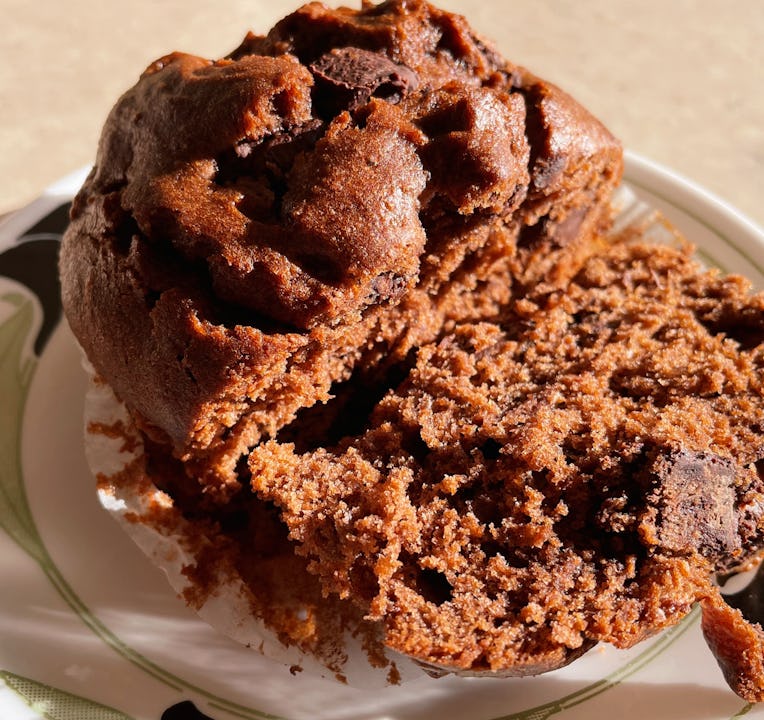 Close-up shot of a chocolate muffin cut in half.
