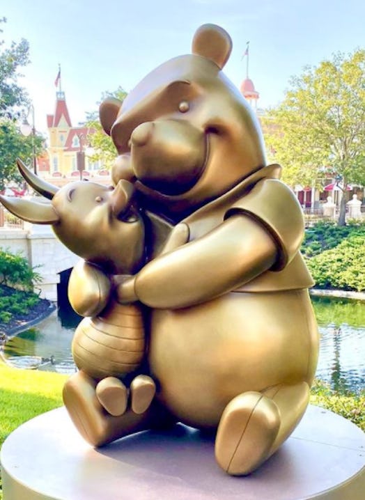 These photos of Disney's gold statues for the 50th anniversary feature one of Winnie the Pooh and Pi...
