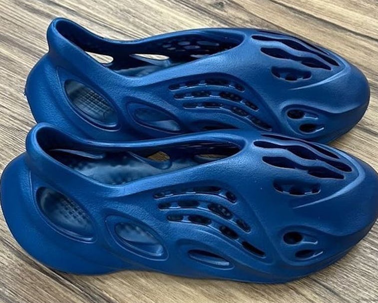 Kanye s Yeezy Foam Runner slippers get shiny with a metallic blue look