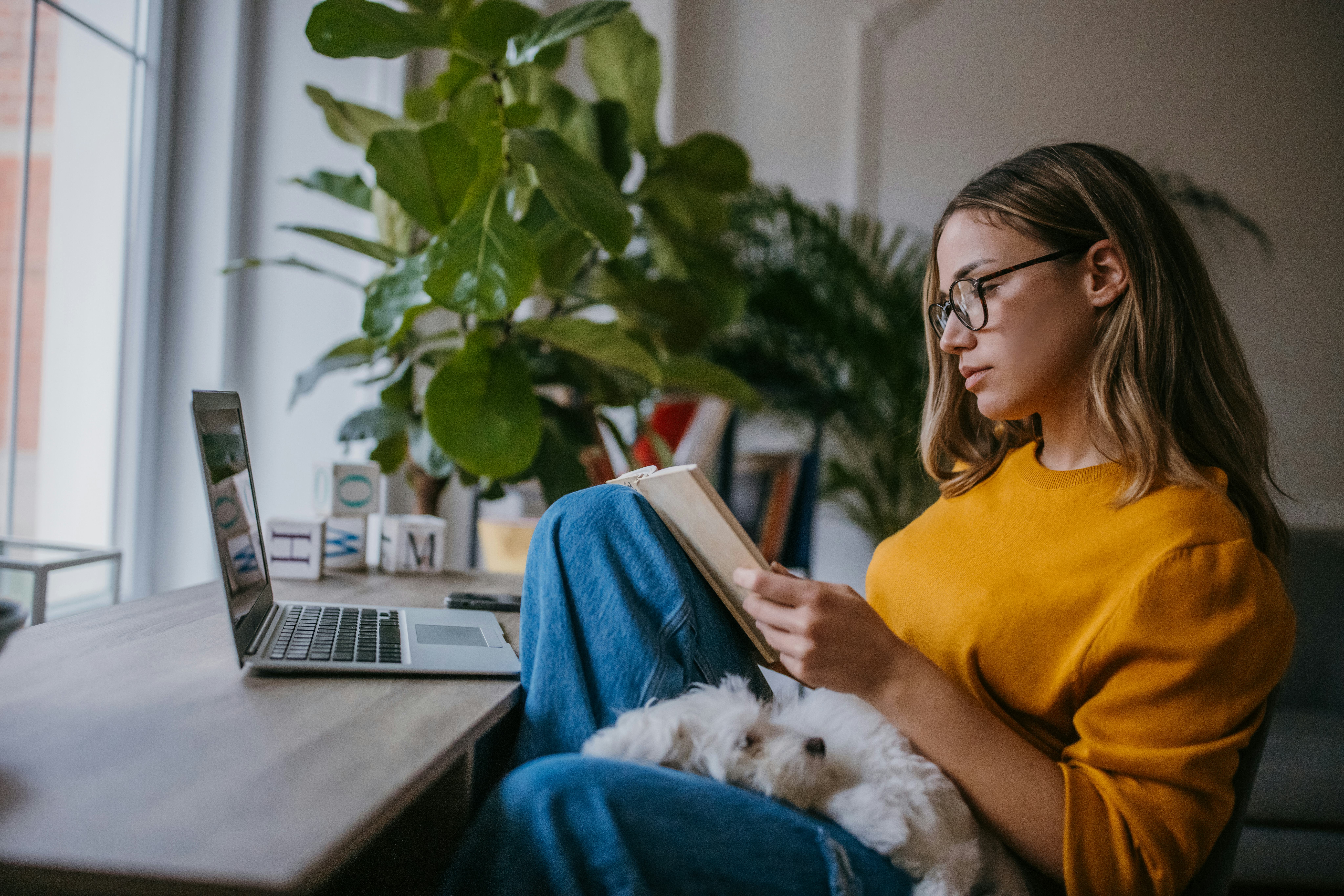A woman reads a book.