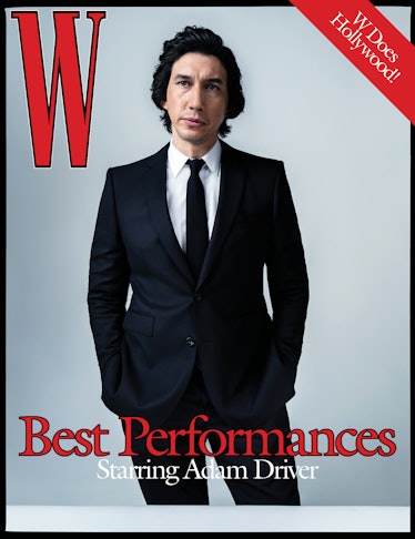 Adam Driver wears a Burberry suit, shirt, and tie.
