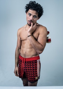 Anthony Ramos wears Adidas Originals by Wales Bonner shorts and sneakers.