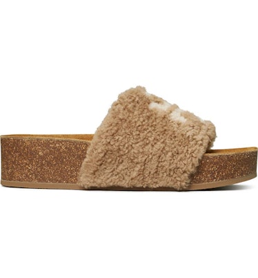 Tory Burch logo shearling flatform.