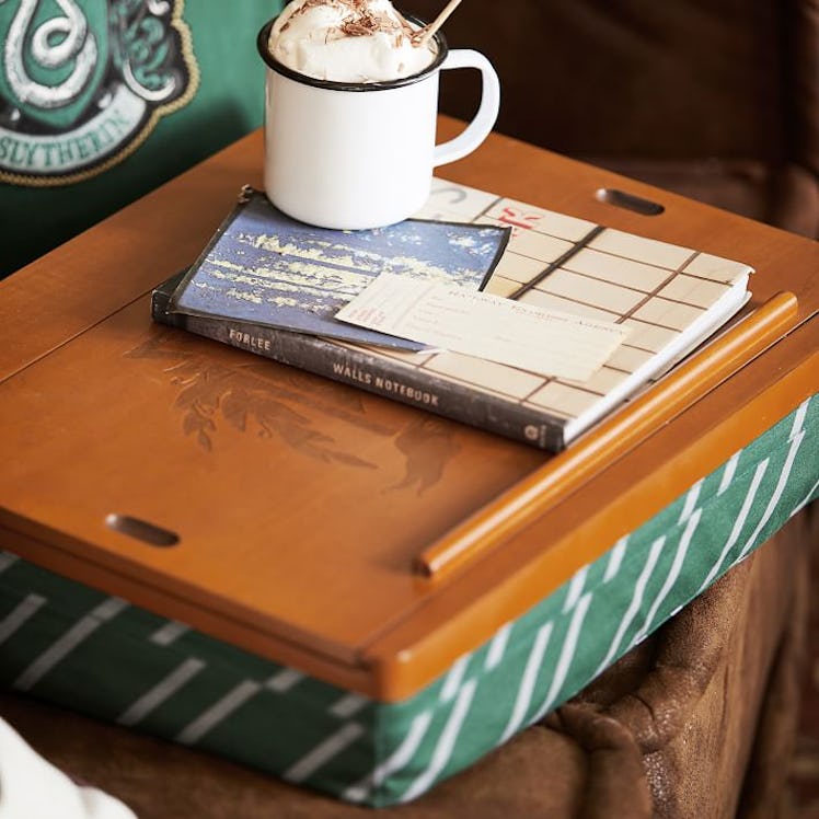 Check out this Slytherin decor from Pottery Barn teen's Harry Potter collection for the most ambitio...