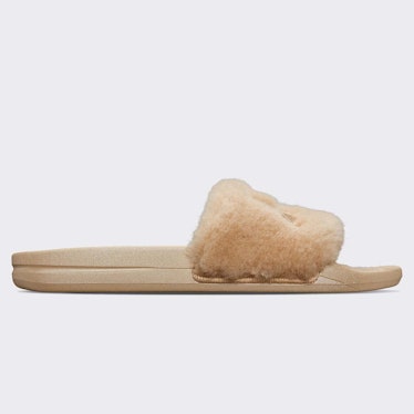 APL beige shearling slides.