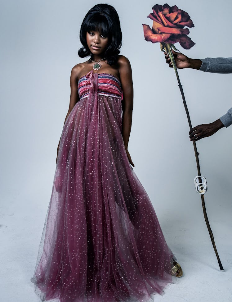 Saniyya Sidney in a purple dress, necklace, and gold sandals on the cover of W Magazine's Best Perfo...