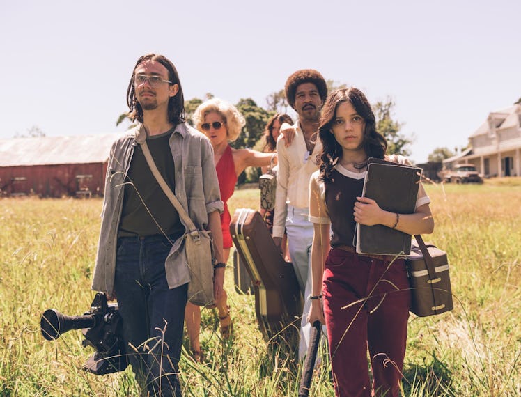 X cast walking in field