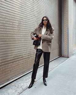 Woman wearing a faux leather pants outfit