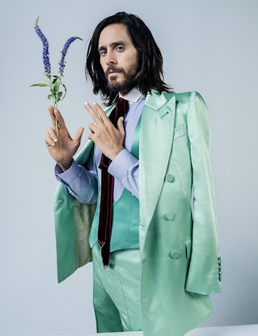 Jared Leto in a green jacket, vest, and pants with a shirt and tie in W Magazine's Best Performances