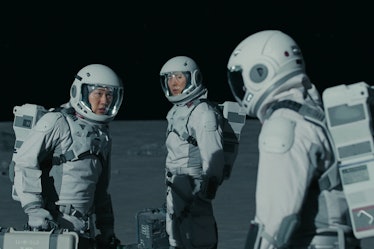 The Silent Sea promotional image showing the cast in white spacesuits against a black background