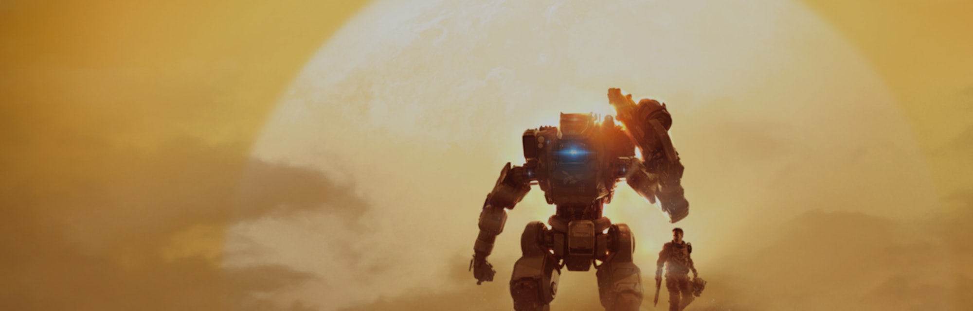 Image from Titanfall 2 game showing mech robot and man standing in front of large, golden sun rising...
