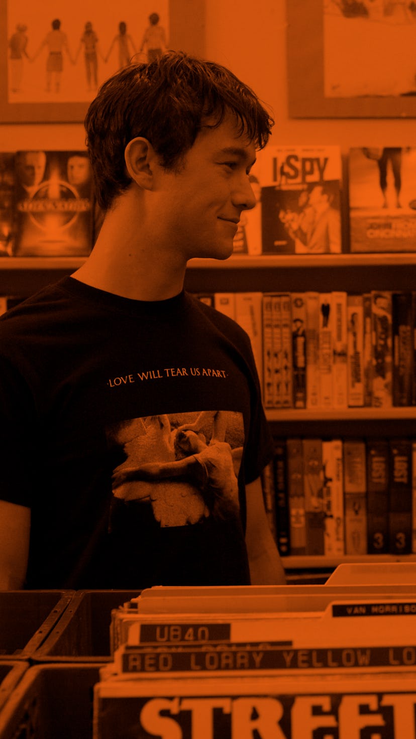 Joseph Gordon-Levitt and Zoe Deschanel looking at each other in the film "500 Days of Summer"