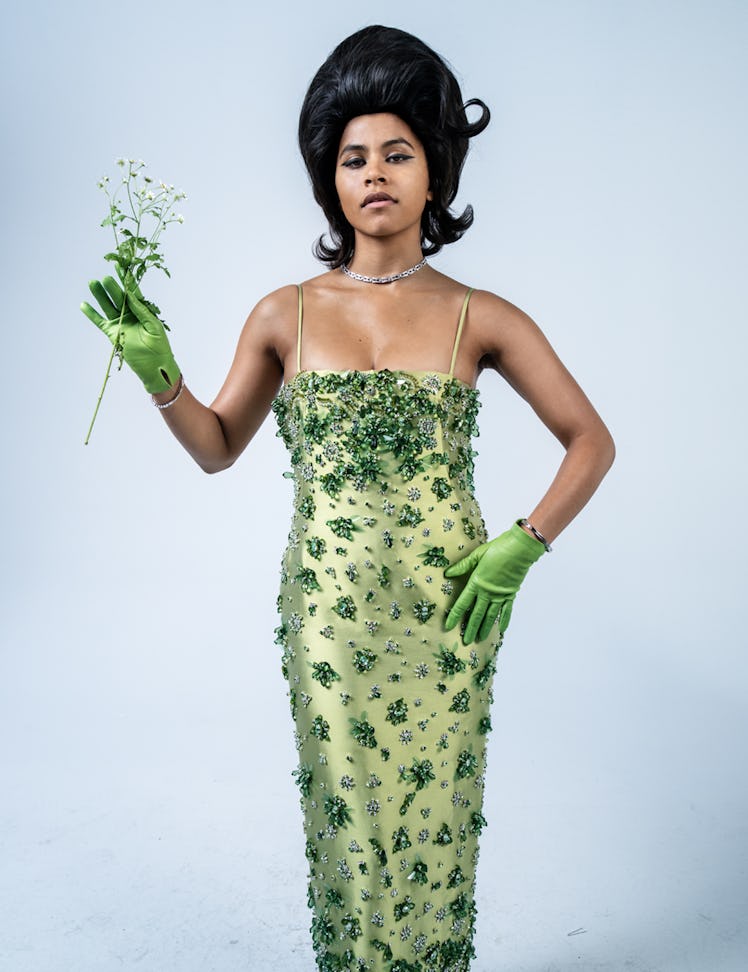 Zazie Beetz in a green dress with flowers as decorations and green gloves in W Magazine's Best Perfo...