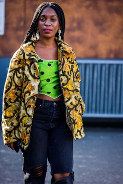 Rajni Jacques wearing a green polka dot bustier underneath a jacket