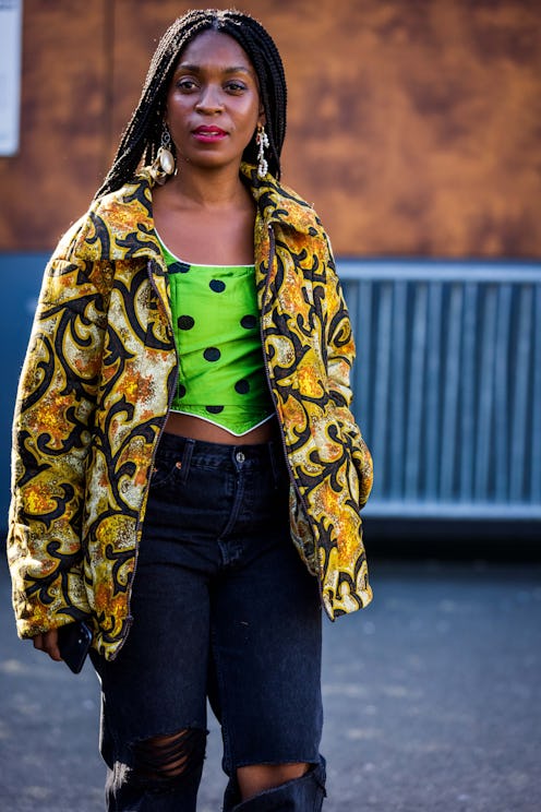 Rajni Jacques wearing a green polka dot bustier underneath a jacket