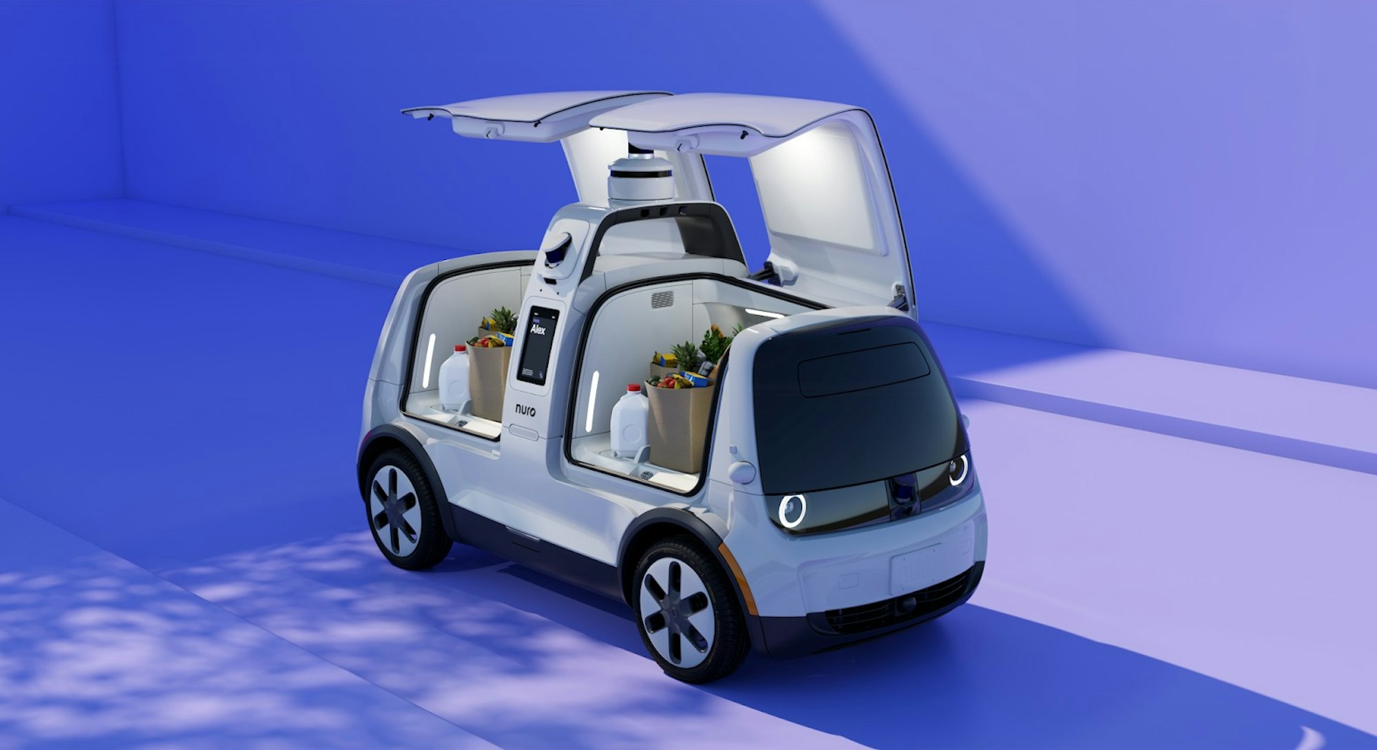 Nuro's electric self-driving delivery robot with airbags on the outside.