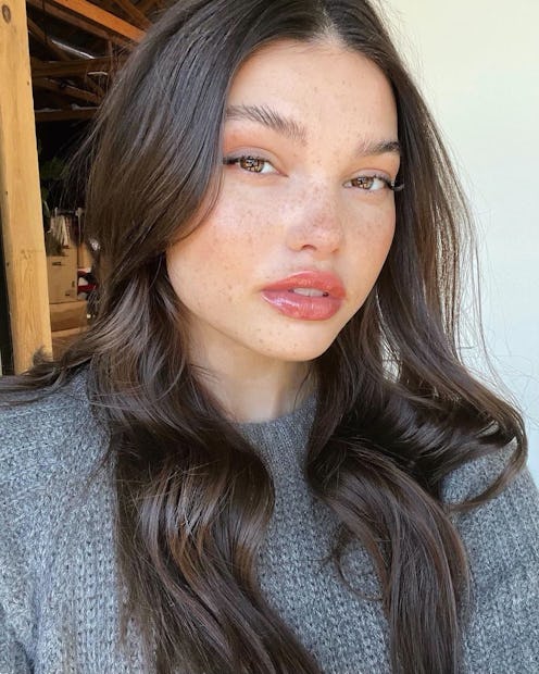 woman wearing lip balm