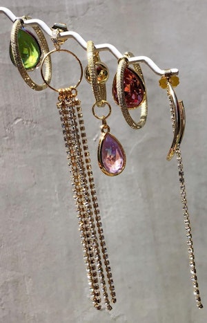 An assortment of colorful crystal and rhinestone jewelry by Mounser