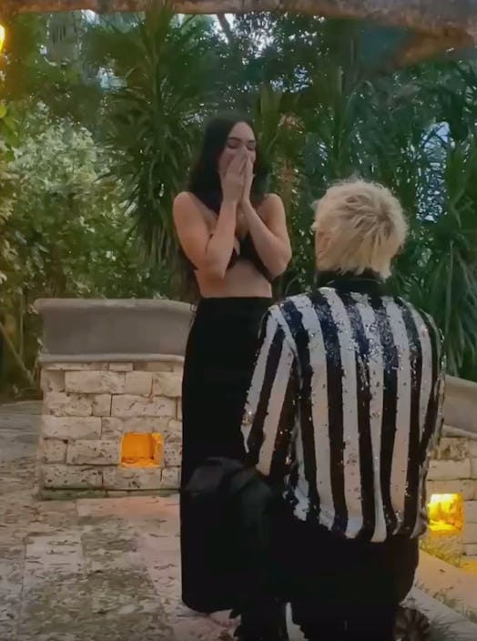 Megan Fox and Machine Gun Kelly's proposal body language was mixed.