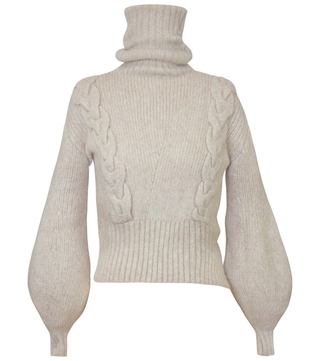 A knitted cashmere wool blend turtleneck sweater by Alejandra Alonso Rojas