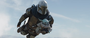 Din Djarin and Grogu flying through the air together in The Mandalorian Season 2