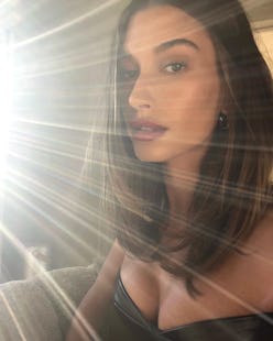 grown out brunette hair on hailey bieber