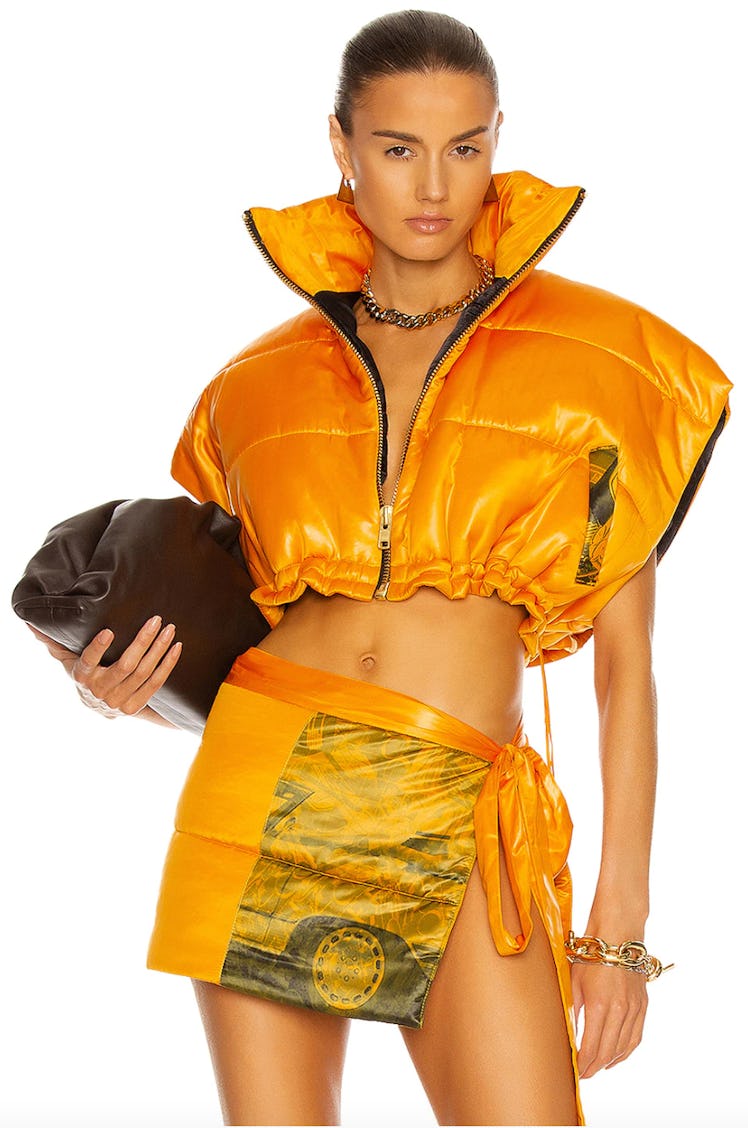 LaQuan Smith's Orange Printed Cropped Puffer Vest. 