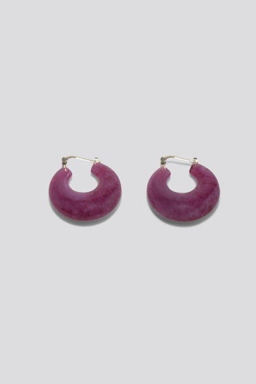 purple acrylic hoop earrings by Rachel Comey