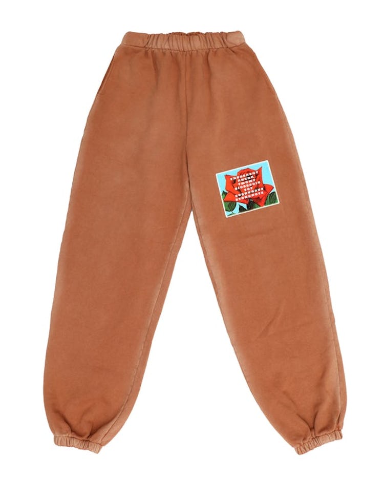Boys Lie orange sweatpants.