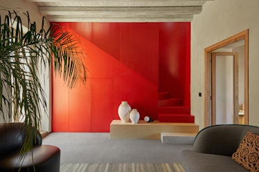 Airbnb's Sicily villa has a red staircase, and you'll be able to live there rent-free for a year. 