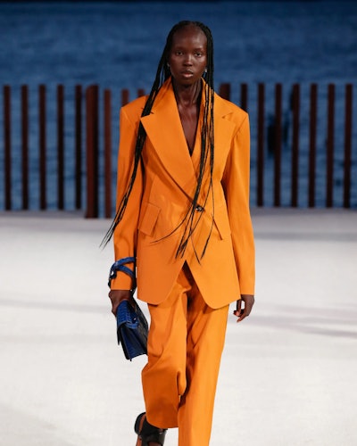 homme girl trend: orange suit