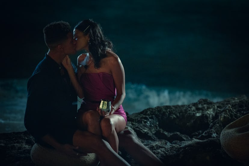 Nathan and Holly share a kiss on Netflix's Too Hot to Handle. Photo courtesy of Netflix.