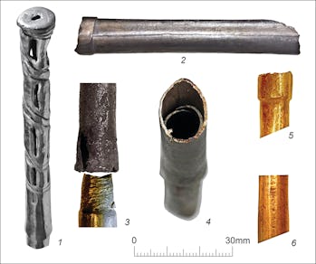 Several individual, short metal tubes made of gold and silver.