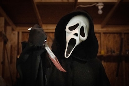 ghostface holding a bloody knife