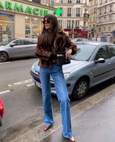 Leisa wearing wide leg jeans and square toe boots