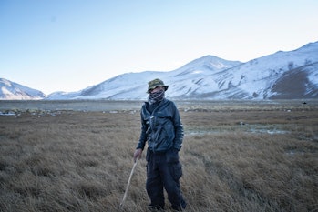 Man in field in Tajikistan