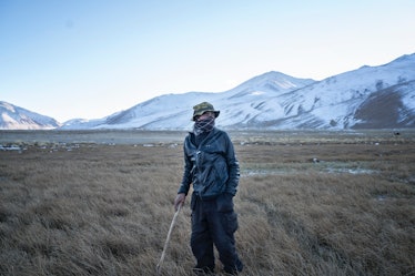 Man in field in Tajikistan