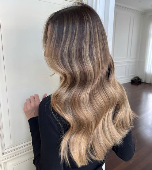 Hair By Nolan model blonde turned away from camera