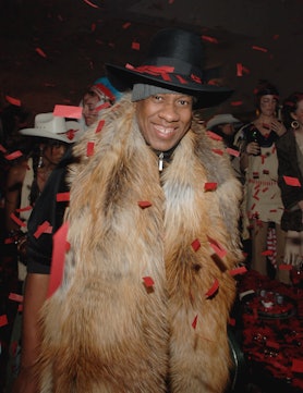 André Leon Talley grinning and wearing fur